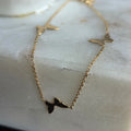 Pulsera de Oro 18K con Dijes de Mariposa