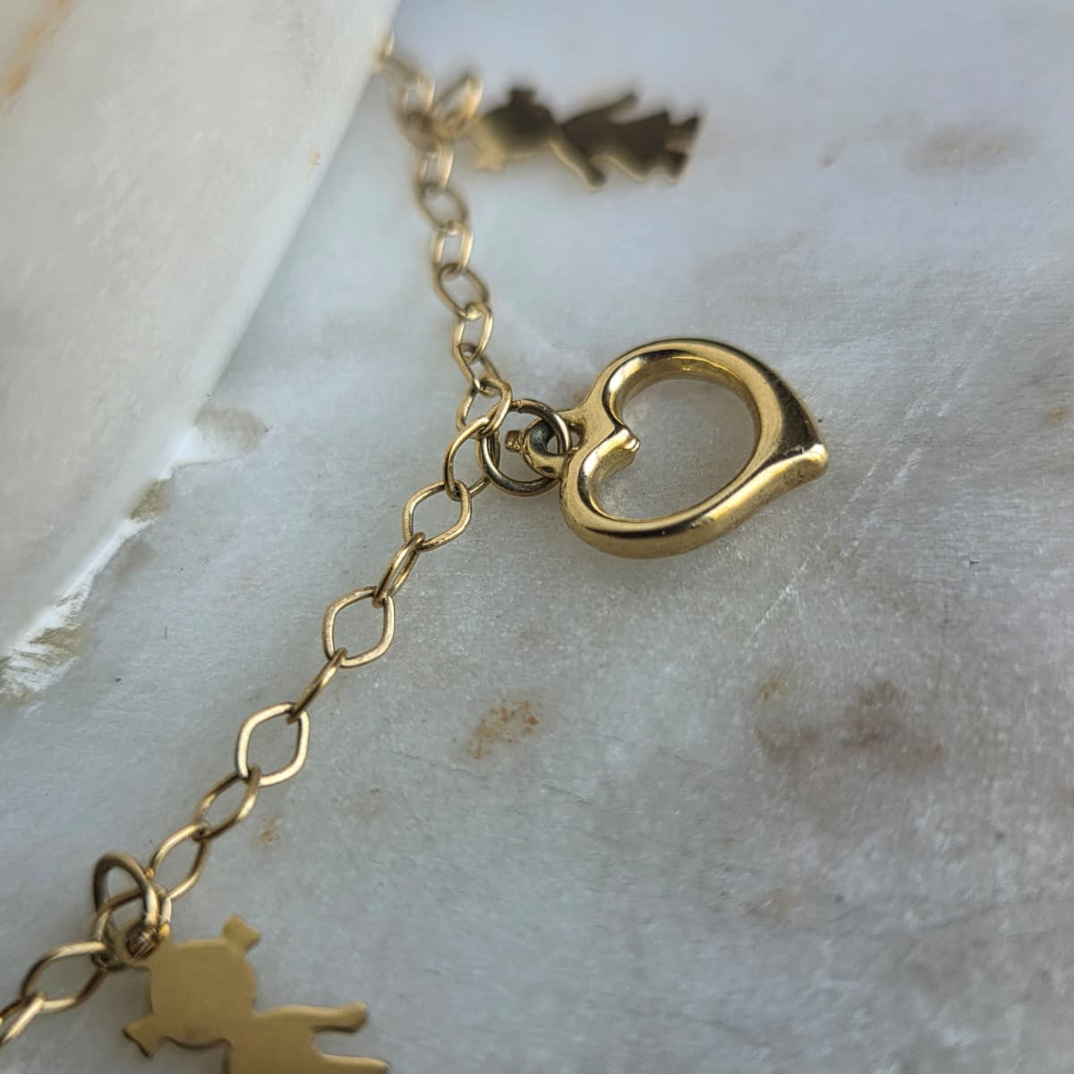 Tobillera de Oro 18K con Dijes