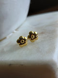 Aretes de oro 18k con forma de flor