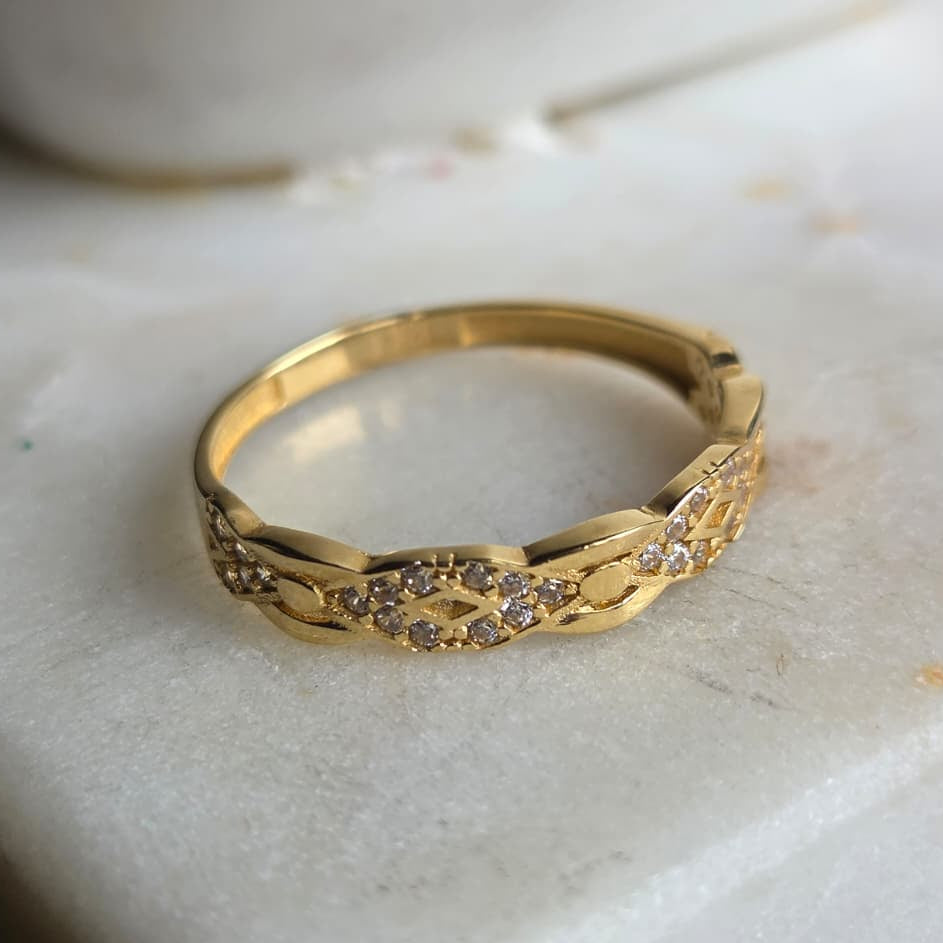 Anillo de Oro 18K Tejido Infinito con Circonias