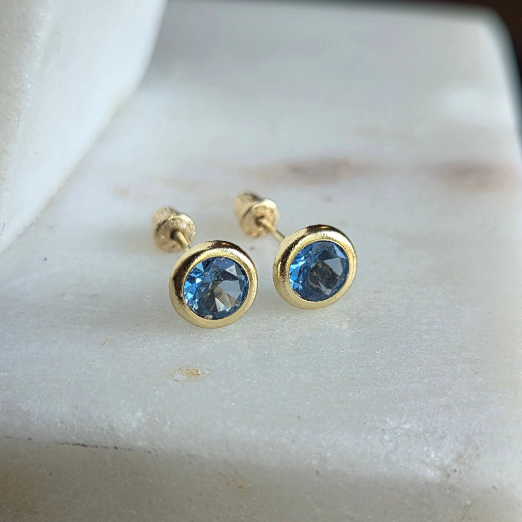 Aretes Redondos con Circonia Azul en Oro de 14K