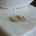 Argollas  huggie en Oro 18K